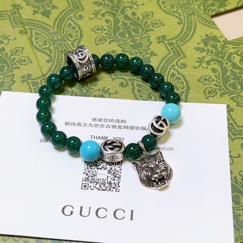 G*u*i bracelets